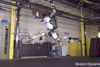 Boston Dynamics показал человекоподобного робота, способного вставать на руки и кувыркаться (видео)
