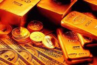 При обыске у экс-начальника управления налоговой Киева изъяли $1 млн и 2 кг золота